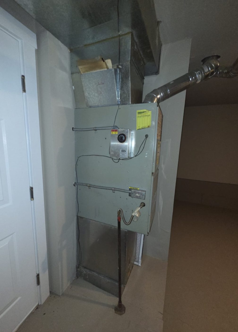 New Eco-installed air conditioning condenser at a Kirkland townhouse