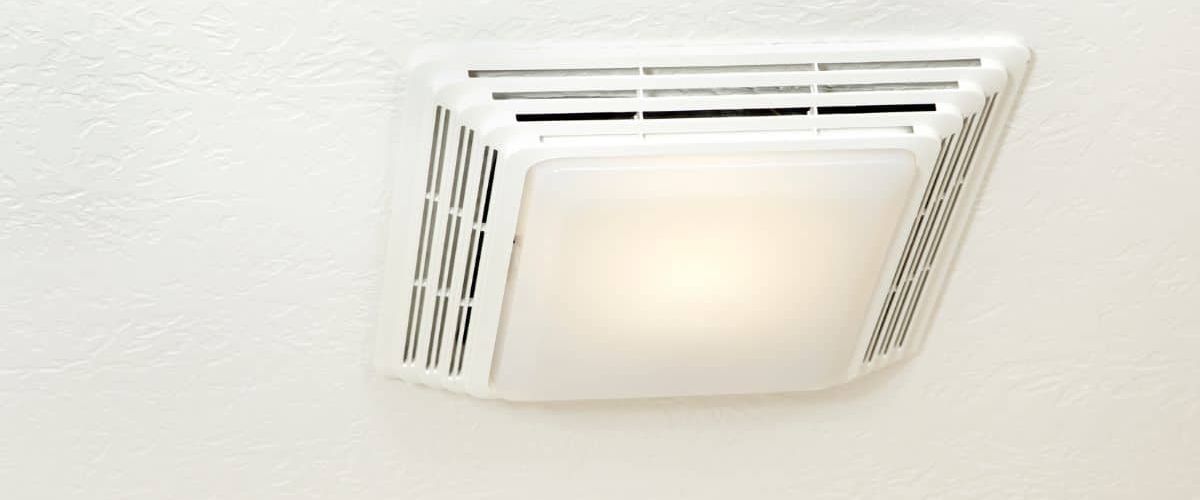 The image shows a ceiling exhaust fan vent, eco electrical and plumbing